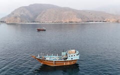 This aerial photograph shows boats anchored off Oman's northern Musandam Peninsula near the Strait of Hormuz on June 27, 2026 (AFP)