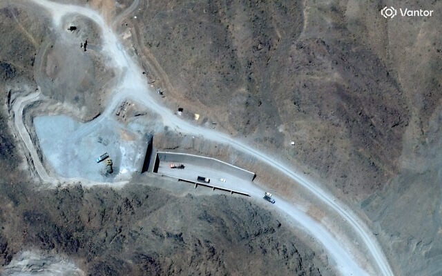 This handout satellite image courtesy of Vantor shows vehicles at the western entrance of the Pickaxe Mountain tunnel complex adjacent to the Natanz Nuclear Facility near Natanz, Isfahan province, central Iran, on June 21, 2026. (Satellite image ©2026 Vantor/AFP) This handout satellite image courtesy of Vantor shows vehicles at the western entrance of the Pickaxe Mountain tunnel complex adjacent to the Natanz Nuclear Facility near Natanz, Isfahan province, central Iran, on June 21, 2026. (Satellite image ©2026 Vantor/AFP)