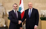 This handout photograph released by the Lebanese Presidency press office shows Lebanon's President Joseph Aoun (R) meeting with Syria's Foreign Minister Asaad al-Shaibani at the presidential palace in Baabda on July 2, 2026. (Photo by Lebanese Presidency / AFP)