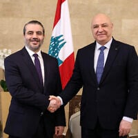 This handout photograph released by the Lebanese Presidency press office shows Lebanon's President Joseph Aoun (R) meeting with Syria's Foreign Minister Asaad al-Shaibani at the presidential palace in Baabda on July 2, 2026. (Photo by Lebanese Presidency / AFP)