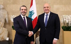 This handout photograph released by the Lebanese Presidency press office shows Lebanon's President Joseph Aoun (R) meeting with Syria's Foreign Minister Asaad al-Shaibani at the presidential palace in Baabda on July 2, 2026. (Photo by Lebanese Presidency / AFP)