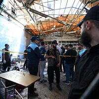 Syrian security forces gather at the site of a deadly explosion at a cafe in the capital Damascus, on July 2, 2026. (LOUAI BESHARA / AFP)