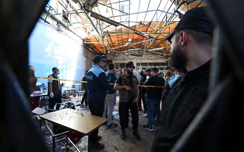 Syrian security forces gather at the site of a deadly explosion at a cafe in the capital Damascus, on July 2, 2026. (LOUAI BESHARA / AFP)