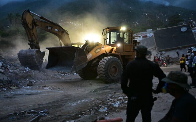 Debris clearance is underway at the site of collapsed buildings in Caraballeda, La Guaira state, Venezuela, on July 3, 2026. (MARTIN BERNETTI / AFP) Debris clearance is underway at the site of collapsed buildings in Caraballeda, La Guaira state, Venezuela, on July 3, 2026. (MARTIN BERNETTI / AFP)