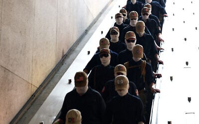 Members of the US white supremacist group Patriot Front enter Eastern Market metro station on July 4, 2026 in Washington, DC. (Finn Gomez / GETTY IMAGES NORTH AMERICA / Getty Images via AFP) Members of the US white supremacist group Patriot Front enter Eastern Market metro station on July 4, 2026 in Washington, DC. (Finn Gomez / GETTY IMAGES NORTH AMERICA / Getty Images via AFP)