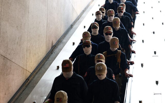 Members of the US white supremacist group Patriot Front enter Eastern Market metro station on July 4, 2026 in Washington, DC. (Finn Gomez / GETTY IMAGES NORTH AMERICA / Getty Images via AFP) Members of the US white supremacist group Patriot Front enter Eastern Market metro station on July 4, 2026 in Washington, DC. (Finn Gomez / GETTY IMAGES NORTH AMERICA / Getty Images via AFP)