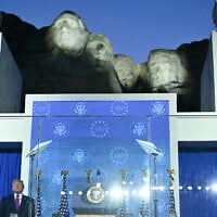 US President Donald Trump steps on stage to deliver remarks during the Independence Day events at Mount Rushmore National Memorial in Keystone, South Dakota, July 3, 2026. (Photo by Mandel NGAN / AFP)