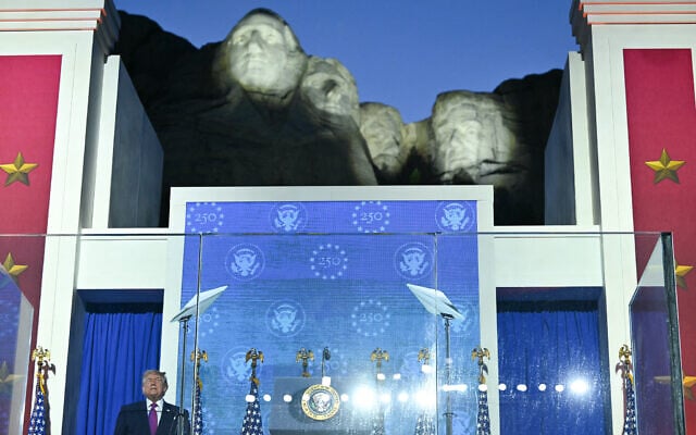 US President Donald Trump steps on stage to deliver remarks during the Independence Day events at Mount Rushmore National Memorial in Keystone, South Dakota, July 3, 2026. (Photo by Mandel NGAN / AFP)