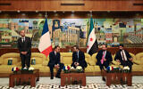 France's President Emmanuel Macron (2nd L) speaks with Syria's Foreign Minister Asaad al-Shaibani (C-R) next to France's Foreign Affairs Minister Jean-Noel Barrot (L) during a bilateral meeting at the Damascus International Airport in Damascus on July 6, 2026. (Ludovic MARIN / AFP)