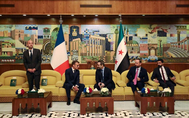 France's President Emmanuel Macron (2nd L) speaks with Syria's Foreign Minister Asaad al-Shaibani (C-R) next to France's Foreign Affairs Minister Jean-Noel Barrot (L) during a bilateral meeting at the Damascus International Airport in Damascus on July 6, 2026. (Ludovic MARIN / AFP) France's President Emmanuel Macron (2nd L) speaks with Syria's Foreign Minister Asaad al-Shaibani (C-R) next to France's Foreign Affairs Minister Jean-Noel Barrot (L) during a bilateral meeting at the Damascus International Airport in Damascus on July 6, 2026. (Ludovic MARIN / AFP)