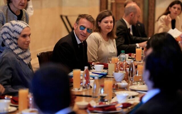 Wearing sunglasses indoors, Macron meets representatives of Syrian civil  society in Damascus | The Times of Israel