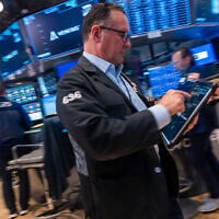 Traders work on the floor of the New York Stock Exchange (NYSE), July 9, 2026, in New York City. (Spencer Platt/Getty Images/AFP)