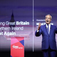 Reform UK leader Nigel Farage speaks during the inaugural Conservative Political Action Conference Great Britain (CPAC GB) in south-east London on July 17, 2026 (Henry Nicholls/AFP)