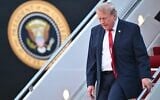 US President Donald Trump steps off Air Force One upon arrival at Joint Base Andrews in Maryland on July 19, 2026. (Mandel NGAN/AFP)