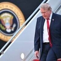 US President Donald Trump steps off Air Force One upon arrival at Joint Base Andrews in Maryland on July 19, 2026. (Mandel NGAN/AFP)
