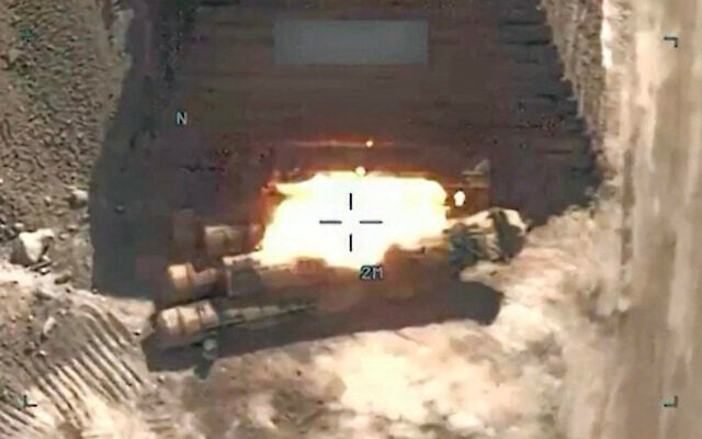 This screen grab made on July 21, 2026 from handout video footage released by the US Central Command (CENTCOM) on July 20, 2026 shows US forces launching what the military says are precision strikes targeting Iranian military capabilities for the tenth consecutive night.