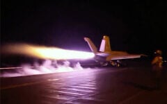 This screen grab made on July 22, 2026 from handout video footage released by the US Central Command on July 21, 2026 shows US forces launching what the military says are precision strikes targeting Iranian military capabilities for the eleventh consecutive night. (CENTCOM via AFP)