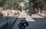 Illustrative: An Israeli Jewish woman prostrates herself on the Temple Mount in Jerusalem on July 23, 2026. (Ilia YEFIMOVICH/AFP)