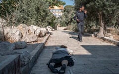 Illustrative: An Israeli Jewish woman prostrates herself on the Temple Mount in Jerusalem on July 23, 2026. (Ilia YEFIMOVICH/AFP)