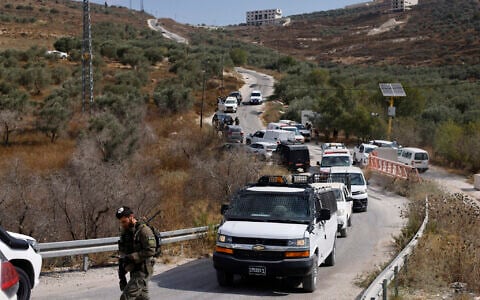 Security personnel arrive at the site of a shooting on the outskirts of Tell in the West Bank, on July 24, 2026. (John Wessels/AFP)