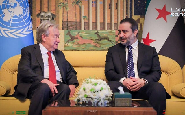 This handout picture taken and released by the official Syrian Arab News Agency (SANA) on July 25, 2026 shows Syria’s Foreign Affairs Minister Asaad al-Shaibani, right, receiving UN Secretary-General Antonio Guterres, left, at Damascus International Airport. (SANA/AFP) This handout picture taken and released by the official Syrian Arab News Agency (SANA) on July 25, 2026 shows Syria’s Foreign Affairs Minister Asaad al-Shaibani, right, receiving UN Secretary-General Antonio Guterres, left, at Damascus International Airport. (SANA/AFP)