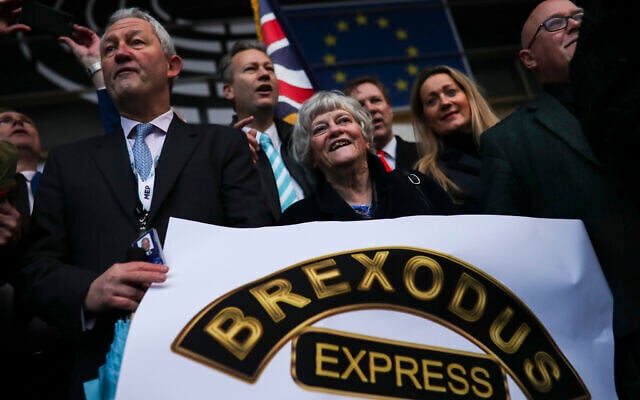 British MEP’s, including Anne Widdecombe, center, celebrate as they march out of European Parliament with their luggage in Brussels to take the Eurostar train back to Britain, January 31, 2020 (AP/Francisco Seco) British MEP’s, including Anne Widdecombe, center, celebrate as they march out of European Parliament with their luggage in Brussels to take the Eurostar train back to Britain, January 31, 2020 (AP/Francisco Seco)