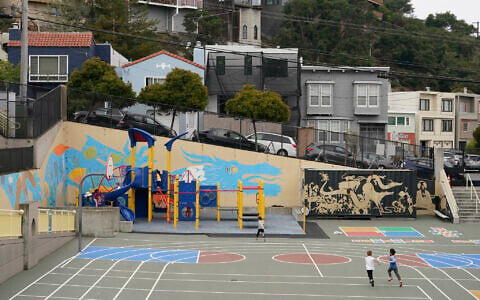 Illustrative: Children play at a public school in San Francisco, California, August 30, 2022. (AP/Eric Risberg)