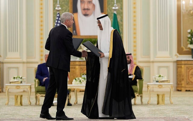 Chris Wright, US Secretary of Energy, left, and Saudi Arabia Energy Minister Prince Abdulaziz Bin Salman, shake hands after exchanging documents during a signing ceremony at the Royal Palace in Riyadh, Saudi Arabia, May 13, 2025. (Alex Brandon/AP)