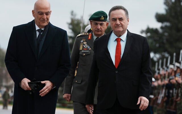 Greek Defense Minister Nikos Dendias, left, and his Israeli counterpart Israel Katz review the honor guard before their meeting in Athens, Greece, January 20, 2026. (AP Photo/Thanassis Stavrakis) Greek Defense Minister Nikos Dendias, left, and his Israeli counterpart Israel Katz review the honor guard before their meeting in Athens, Greece, January 20, 2026. (AP Photo/Thanassis Stavrakis)