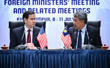 US Secretary of State Marco Rubio, left, takes part in a memorandum of understanding signing with Malaysia’s Minister of Foreign Affairs Mohamad Hasan during the 58th Association of Southeast Asian Nations (ASEAN) Foreign Ministers’ meeting and related meetings at the Convention Center in Kuala Lumpur, July 10, 2025. (Mandel Ngan/Pool via AP)