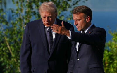 US President Donald Trump talks with France’s President Emmanuel Macron at the G7 summit, June 15, 2026, in Evian-les-Bains, France. (AP Photo/ Julia Demaree Nikhinson) US President Donald Trump talks with France’s President Emmanuel Macron at the G7 summit, June 15, 2026, in Evian-les-Bains, France. (AP Photo/ Julia Demaree Nikhinson)