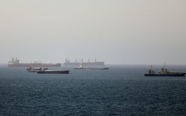 Tankers and cargo vessels are seen in the Gulf of Oman, along shipping routes linking the Strait of Hormuz and the Arabian Sea, June 16, 2026. (AP)