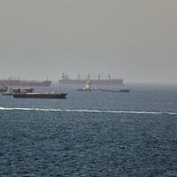 Tankers and cargo vessels are seen in the Gulf of Oman, along shipping routes linking the Strait of Hormuz and the Arabian Sea, June 16, 2026. (AP Photo)