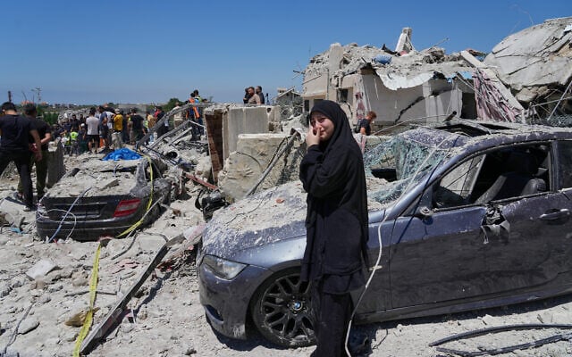 A relative of a missing victim, weeps at the site of destroyed buildings that were hit in an Israeli airstrike in Qannarit village, southern Lebanon, June 20, 2026. (AP Photo/Mohammed Zaatari) A relative of a missing victim, weeps at the site of destroyed buildings that were hit in an Israeli airstrike in Qannarit village, southern Lebanon, June 20, 2026. (AP Photo/Mohammed Zaatari)