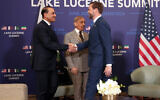 US Vice President JD Vance, right, shakes hands with Pakistan's Chief of Army Staff Field Marshal Asim Munir, left, next to Pakistan's Prime Minister Shehbaz Sharif, center, as they meet for high-level talks at the Buergenstock Resort Lake Lucerne, near Stansstad, Switzerland, Sunday, June 21, 2026. (Nathan Howard/Pool Photo via AP)