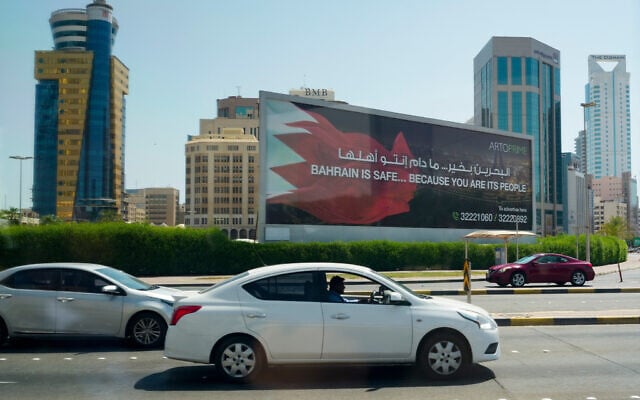 Cars pass by a billboard as U.S. Secretary of State Marco Rubio is in the country to discuss an interim deal between the U.S. and Iran with Arab Gulf allies, in Manama, Bahrain, Thursday, June 25, 2026. (Eric Lee/Pool Photo via AP)