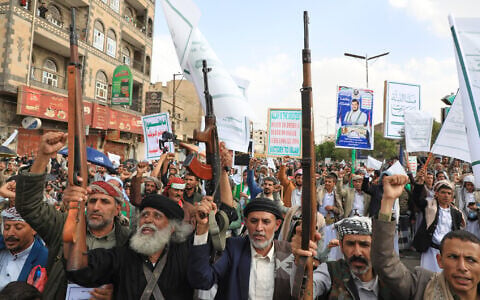 Houthis shout slogans during a celebration to commemorate the 7th-century martyrdom of Imam Hussein, one of Prophet Muhammad's grandsons and one of Shiite Islam's most beloved saints, in Sanaa, Yemen, June 25, 2026. (AP Photo/Osamah Abdulrahman)