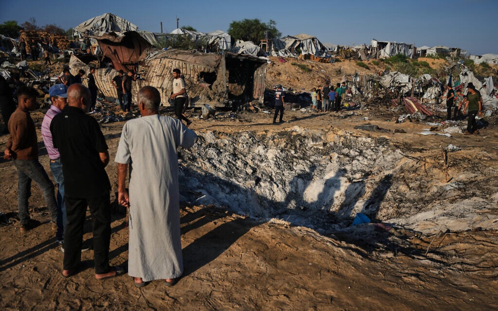 Illustrative: Palestinians inspect damage to their tents following an Israeli airstrike in Khan Younis, Gaza Strip, Tuesday, June 30, 2026. (AP Photo/Abdel Kareem Hana)
