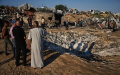 Illustrative: Palestinians inspect damage to their tents following an Israeli airstrike in Khan Younis, Gaza Strip, Tuesday, June 30, 2026. (AP Photo/Abdel Kareem Hana)
