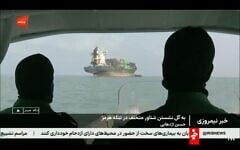 This frame grab of footage aired July 1, 2026, by Iranian state television shows a vessel that ran aground in the Strait of Hormuz. (Iranian state television via AP)