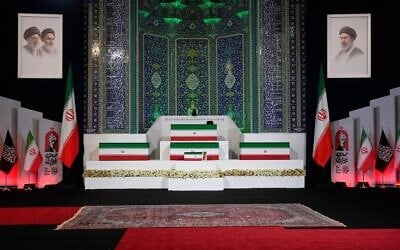 The coffins of slain Iranian supreme leader Ali Khamenei, center top, and members of his family are displayed ahead of the days-long funeral ceremonies at the Imam Khomeini Mosalla Grand Mosque in Tehran, Iran, July 3, 2026. (AP Photo/Vahid Salemi)
