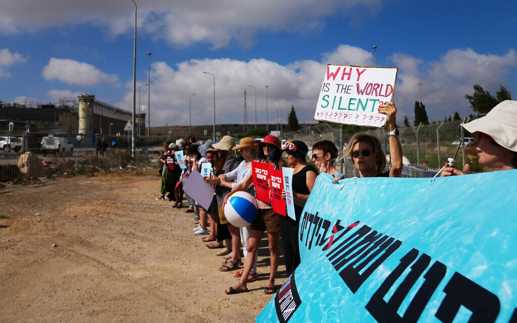 Activists gather in a protest outside Ofer military prison near Jerusalem, July 3, 2026, calling for an end to Israel's use of administrative detention for Palestinian children. (AP Photo/Mahmoud Illean)