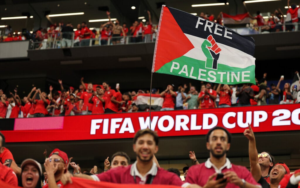 Egyptian fans celebrate with a 'Free Palestine' flag after winning the World Cup round of 32 soccer match between Australia and Egypt in Arlington, Texas, July 3, 2026. (AP Photo/Gareth Patterson) Egyptian fans celebrate with a 'Free Palestine' flag after winning the World Cup round of 32 soccer match between Australia and Egypt in Arlington, Texas, July 3, 2026. (AP Photo/Gareth Patterson)
