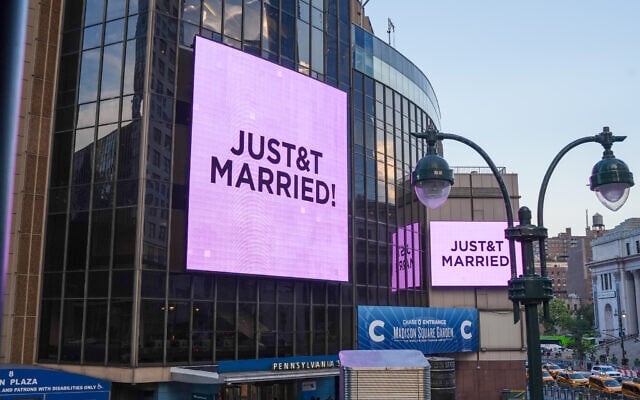 A "'Just Married' sign is displayed on Madison Square Garden during a wedding between singer Taylor Swift and National Football League player Travis Kelce on July 3, 2026, in New York. (AP Photo/Ryan Murphy)
