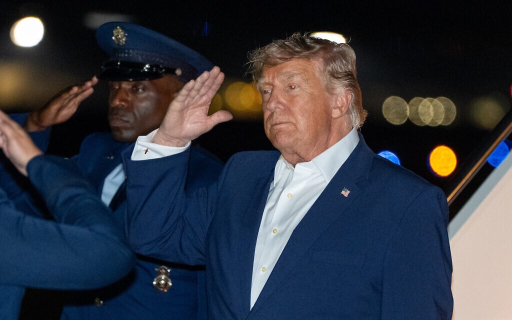 US President Donald Trump salutes as he arrives on Air Force One, July 4, 2026, at Joint Base Andrews, Md. (AP Photo/Alex Brandon)