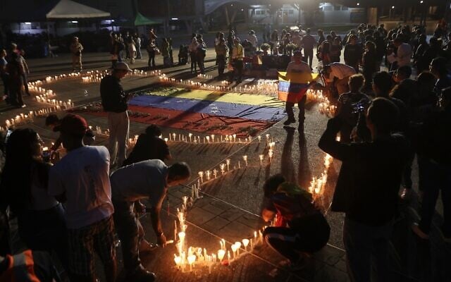 People hold a vigil for the victims of Venezuela's powerful twin quakes in Caracas, Venezuela, on July 5, 2026. (AP Photo/Pedro Mattey) People hold a vigil for the victims of Venezuela's powerful twin quakes in Caracas, Venezuela, on July 5, 2026. (AP Photo/Pedro Mattey)