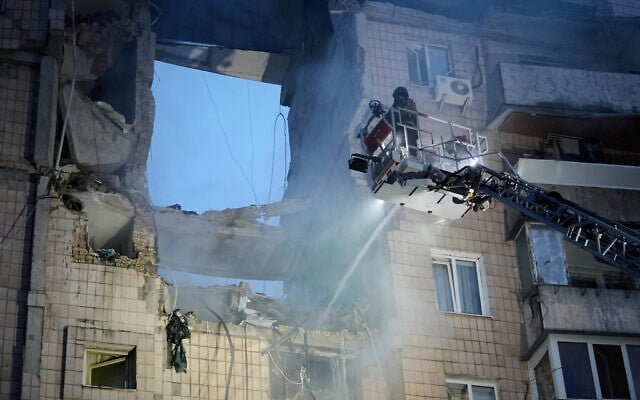 Rescuers work at the scene of a building damaged by Russian missile attack in Kyiv, Ukraine, July 6, 2026. (AP/Efrem Lukatsky) Rescuers work at the scene of a building damaged by Russian missile attack in Kyiv, Ukraine, July 6, 2026. (AP/Efrem Lukatsky)