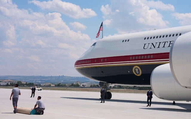 Staff lay a carpet on the tarmac before US President Donald Trump exits Air Force One upon arriving for the NATO summit in Ankara, Turkey, July 7, 2026. (AP Photo/Alex Brandon) Staff lay a carpet on the tarmac before US President Donald Trump exits Air Force One upon arriving for the NATO summit in Ankara, Turkey, July 7, 2026. (AP Photo/Alex Brandon)