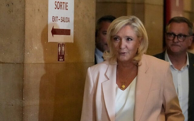 Far-right leader Marine Le Pen arrives at the courtroom for the verdict of her appeals trial, in Paris, France, July 7, 2026. (AP/Michel Euler) Far-right leader Marine Le Pen arrives at the courtroom for the verdict of her appeals trial, in Paris, France, July 7, 2026. (AP/Michel Euler)