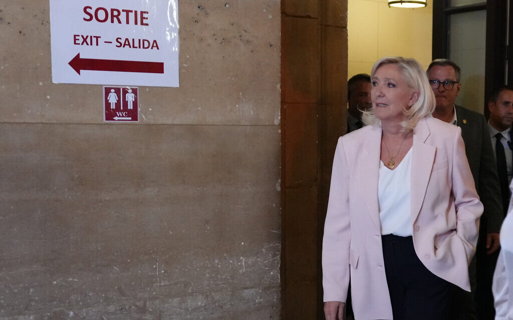 Far-right leader Marine Le Pen arrives at the courtroom for the verdict of her appeals trial, in Paris, France, July 7, 2026. (AP Photo/Aurelien Morissard) Far-right leader Marine Le Pen arrives at the courtroom for the verdict of her appeals trial, in Paris, France, July 7, 2026. (AP Photo/Aurelien Morissard)
